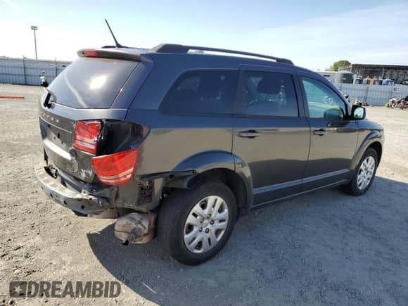 2017 Dodge Journey SE with VIN 3C4PDCAB3HT551168, listed as a Copart auction lot 71287445 with 148,553 mi miles and Salvage title. Bid and sale history available at DreamBid. Image 3.