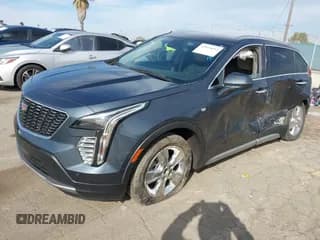 ✅ 2020 Cadillac XT4 AWD Premium Luxury • VIN: 1GYFZDR42LF020100 • Лот: 43664662. Опубликован ранее на IAAI с пробегом 80 925 миль. Бесплатный доступ к архиву аукционных продаж из США и подробный отчёт об истории автомобиля на DreamBid. Изображение 2.