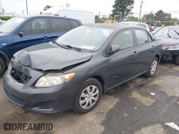 ✅ 2010 Toyota Corolla • VIN: 1NXBU4EEXAZ223869 • Lot: 40414351. Listed on IAAI with 215,219 mi. Free auction sales archive from the USA and detailed vehicle history report at DreamBid. Image 2.