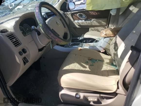 2005 Mercury Mariner Luxury с VIN 4M2CU56125DJ17538, выставлен на аукционе Copart как лот 46948345 с пробегом 158 277 миль миль и Списание • Salvage title. История ставок и продаж доступна на DreamBid. Изображение 7.