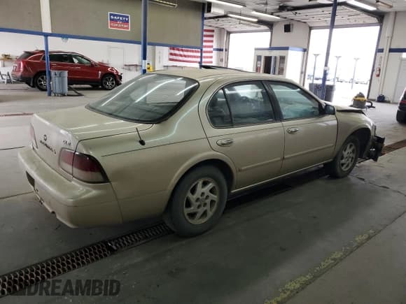 ✅ 1997 Nissan Maxima GXE • VIN: JN1CA21D1VT873935 • Lot: 70561535. Listed on Copart with 279,481 mi. Free auction sales archive from the USA and detailed vehicle history report at DreamBid. Image 3.