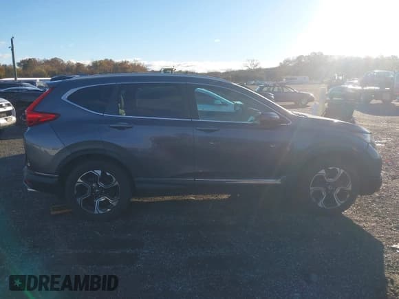 ✅ 2017 Honda CR-V Touring • VIN: 2HKRW2H97HH612456 • Lot: 43560410. Listed on IAAI with 120,652 mi. Free auction sales archive from the USA and detailed vehicle history report at DreamBid. Image 13.
