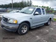 ✅ 2002 Ford F-150 XL • VIN: 2FTRX17L42CA98695 • Lot: 42154232. Listed on IAAI with 180,924 mi. Free auction sales archive from the USA and detailed vehicle history report at DreamBid. Image 2.