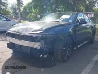 2024 Hyundai Sonata SEL z VIN KMHL64JA1RA411582, wystawiony jako IAAI lot #43092557 z przebiegiem 14 411 mil mil oraz . Historia ofert i sprzedaży dostępna na DreamBid. Obrazek 2.