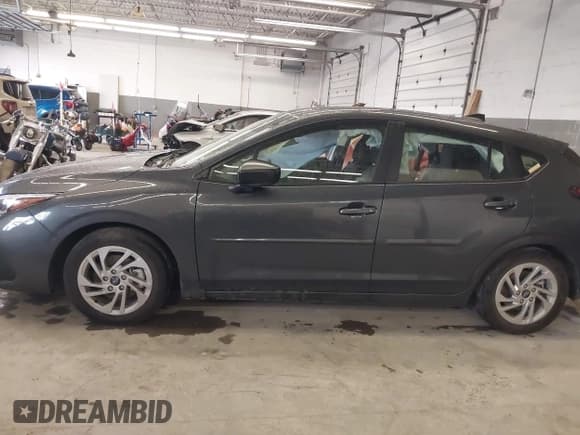 ✅ 2025 Subaru Impreza • VIN: JF1GUABC1S8219821 • Lot: 43498280. Listed on IAAI with 13,411 mi. Free auction sales archive from the USA and detailed vehicle history report at DreamBid. Image 14.