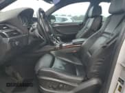 ✅ 2013 BMW X6 xDrive50i • VIN: 5UXFG8C56DL591997 • Lot: 80327235. Wystawiony na Copart z przebiegiem 165 016 mil. Bezpłatny archiwum sprzedaży aukcyjnych z USA i szczegółowy raport historii pojazdu na DreamBid. Zdjęcie 7.