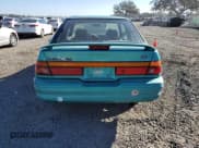 ✅ 1995 Ford Escort • VIN: 3FASP11J4SR216881 • Lot: 82966474. Listed on Copart with 172,397 mi. Free auction sales archive from the USA and detailed vehicle history report at DreamBid. Image 6.