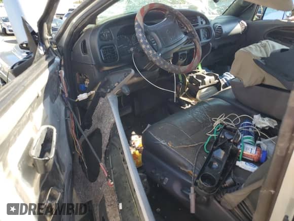 2001 Dodge 1500 с VIN 1B7HF13Z51J598129, выставлен на аукционе Copart как лот 74184494 с пробегом Не указан миль и Списание • Salvage title. История ставок и продаж доступна на DreamBid. Изображение 8.