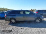 ✅ 2012 Honda Odyssey EX-L • VIN: 5FNRL5H68CB117867 • Лот: 43472829. Опубликован ранее на IAAI с пробегом 240 473 миль. Бесплатный доступ к архиву аукционных продаж из США и подробный отчёт об истории автомобиля на DreamBid. Изображение 13.