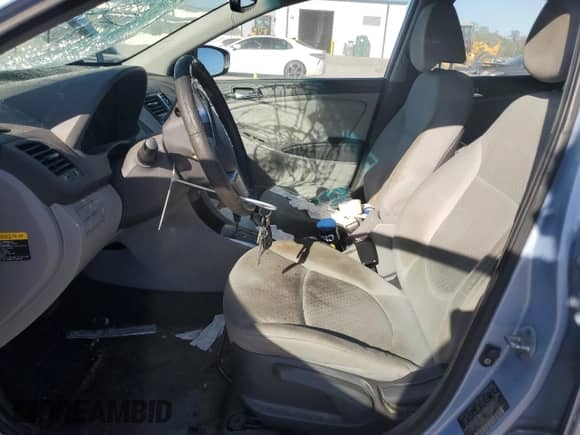 2012 Hyundai Accent SE with VIN KMHCU5AE3CU043488, listed as a Copart auction lot 87283305 with 136,528 mi miles and Salvage title. Bid and sale history available at DreamBid. Image 7.