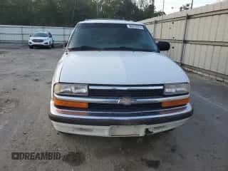 1999 Chevrolet Blazer LS z VIN 1GNCS13W1X2162495, wystawiony jako Copart lot #80019274 z przebiegiem Nie podano mil oraz Szkoda całkowita • Salvage title. Historia ofert i sprzedaży dostępna na DreamBid. Obrazek 5.