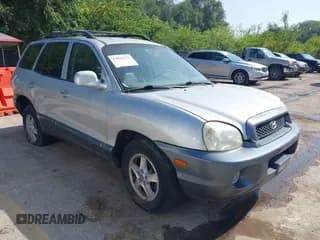 ✅ 2004 Hyundai Santa Fe GLS • VIN: KM8SC73E94U665022 • Lot: 43022376. Listed on IAAI with 220,295 mi. Free auction sales archive from the USA and detailed vehicle history report at DreamBid. Image 1.