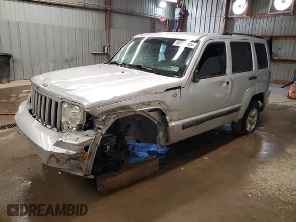 ✅ 2010 Jeep Liberty Sport • VIN: 1J4PN2GK7AW114217 • Lot: 86994205. Listed on Copart with 128,388 mi. Free auction sales archive from the USA and detailed vehicle history report at DreamBid. Image 1.