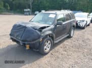 ✅ 2011 Ford Escape Hybrid • VIN: 1FMCU4K37BKA45651 • Lot: 42441757. Listed on IAAI with 504,073 mi. Free auction sales archive from the USA and detailed vehicle history report at DreamBid. Image 2.