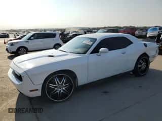2013 Dodge Challenger SXT z VIN 2C3CDYAG1DH649372, wystawiony jako Copart lot #65924934 z przebiegiem 169 588 mil mil oraz Szkoda całkowita • Salvage title. Historia ofert i sprzedaży dostępna na DreamBid. Obrazek 1.