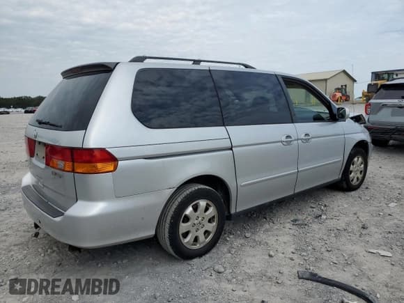 ✅ 2003 Honda Odyssey EX-L • VIN: 5FNRL18903B028216 • Lot: 66751834. Listed on Copart with Not provided. Free auction sales archive from the USA and detailed vehicle history report at DreamBid. Image 3.