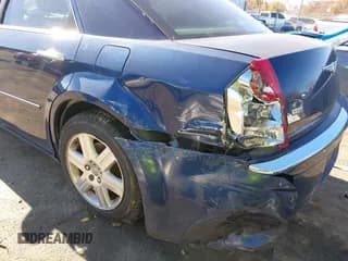 ✅ 2005 Chrysler 300 300C AWD • VIN: 2C3AK63H35H671950 • Lot: 43671496. Wystawiony na IAAI z przebiegiem 198 213 mil. Bezpłatny archiwum sprzedaży aukcyjnych z USA i szczegółowy raport historii pojazdu na DreamBid. Zdjęcie 6.