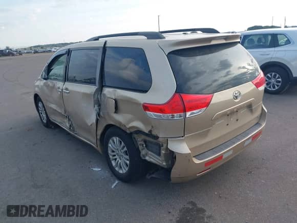 2011 Toyota Sienna XLE AAS with VIN 5TDYK3DC2BS122538, listed as a IAAI auction lot 43247955 with 238,815 mi miles and . Bid and sale history available at DreamBid. Image 3.