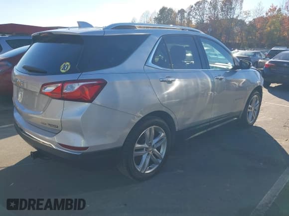 ✅ 2018 Chevrolet Equinox Premier • VIN: 2GNAXVEV6J6312308 • Лот: 43537199. Опубликован ранее на IAAI с пробегом 169 894 миль. Бесплатный доступ к архиву аукционных продаж из США и подробный отчёт об истории автомобиля на DreamBid. Изображение 4.