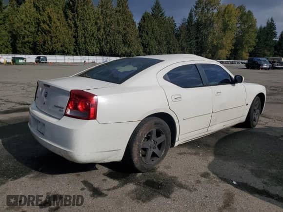 ✅ 2010 Dodge Charger SXT • VIN: 2B3CA3CV0AH155875 • Lot: 87068775. Listed on Copart with 220,120 mi. Free auction sales archive from the USA and detailed vehicle history report at DreamBid. Image 3.