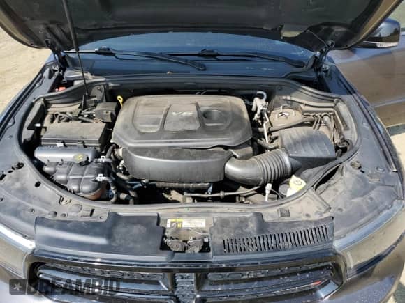 2018 Dodge Durango GT z VIN 1C4RDJDG7JC404857, wystawiony jako Copart lot #65951125 z przebiegiem 166 015 mil mil oraz Szkoda całkowita • Salvage title. Historia ofert i sprzedaży dostępna na DreamBid. Obrazek 12.