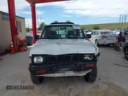 ✅ 1996 Nissan Frontier XE • VIN: 1N6SD11Y9TC362092 • Lot: 41688915. Listed on IAAI with 276,908 mi. Free auction sales archive from the USA and detailed vehicle history report at DreamBid. Image 12.