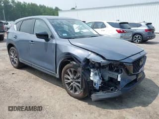 ✅ 2023 Mazda CX-5 S Carbon Edition • VIN: JM3KFBCM5P0179462 • Лот: 42451109. Опубликован ранее на IAAI с пробегом 14 170 миль. Бесплатный доступ к архиву аукционных продаж из США и подробный отчёт об истории автомобиля на DreamBid. Изображение 1.