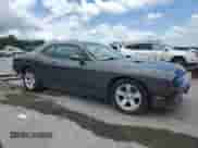 2014 Dodge Challenger SXT 100th Anniversary with VIN 2C3CDYAG6EH294961, listed as a Copart auction lot 58790705 with 184,498 mi miles and Salvage title. Bid and sale history available at DreamBid. Image 4.