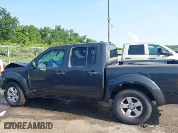 ✅ 2010 Nissan Frontier SE • VIN: 1N6AD0ER7AC430752 • Lot: 42388224. Listed on IAAI with 196,042 mi. Free auction sales archive from the USA and detailed vehicle history report at DreamBid. Image 14.