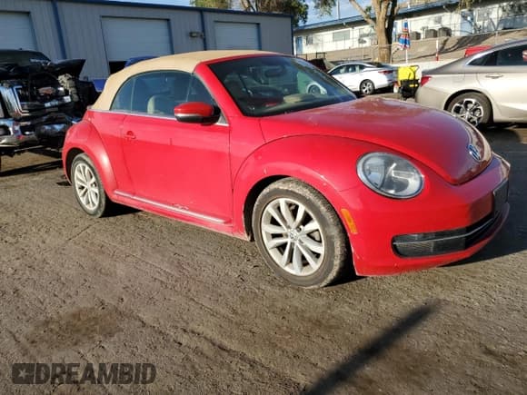 ✅ 2014 Volkswagen Beetle 2.0L TDI • VIN: 3VW5L7AT9EM804409 • Lot: 62685905. Listed on Copart with 91,277 mi. Free auction sales archive from the USA and detailed vehicle history report at DreamBid. Image 4.