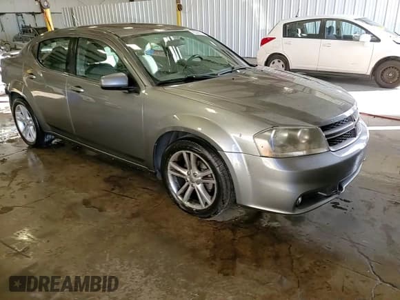 ✅ 2013 Dodge Avenger SXT • VIN: 1C3CDZCB4DN582958 • Lot: 93290285. Listed on Copart with 146,797 mi. Free auction sales archive from the USA and detailed vehicle history report at DreamBid. Image 14.