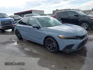 ✅ 2024 Honda Civic Sport Touring • VIN: 19XFL1G88RE011755 • Lot: 43459157. Wystawiony na IAAI z przebiegiem 5 597 mil. Bezpłatny archiwum sprzedaży aukcyjnych z USA i szczegółowy raport historii pojazdu na DreamBid. Zdjęcie 1.