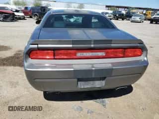 2012 Dodge Challenger SXT z VIN 2C3CDYAG4CH153576, wystawiony jako Copart lot #71494414 z przebiegiem 139 650 mil mil oraz Szkoda całkowita • Salvage title. Historia ofert i sprzedaży dostępna na DreamBid. Obrazek 6.