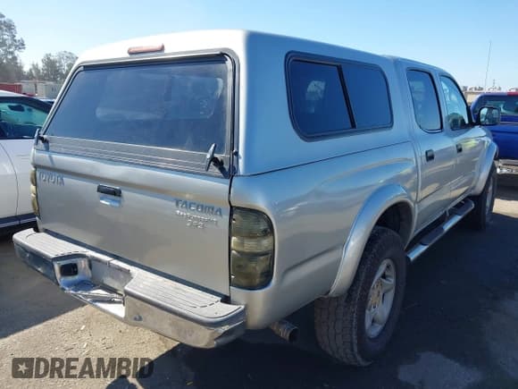 ✅ 2001 Toyota Tacoma PreRunner • VIN: 5TEGN92N41Z850910 • Lot: 42609994. Listed on IAAI with 288,726 mi. Free auction sales archive from the USA and detailed vehicle history report at DreamBid. Image 4.