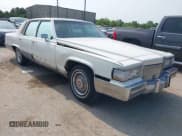 ✅ 1991 Cadillac Brougham • VIN: 1G6DW54E8MR707645 • Лот: 42316792. Опубликован ранее на IAAI с пробегом 305 777 миль. Бесплатный доступ к архиву аукционных продаж из США и подробный отчёт об истории автомобиля на DreamBid. Изображение 1.