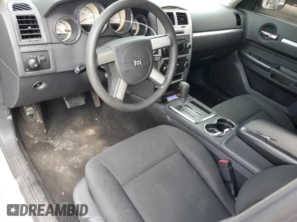 2009 Dodge Charger SXT с VIN 2B3KA33V69H504044, выставлен на аукционе Copart как лот 54199914 с пробегом 214 200 миль миль и Списание • Salvage title. История ставок и продаж доступна на DreamBid. Изображение 8.