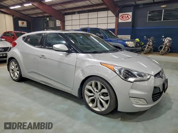 ✅ 2013 Hyundai Veloster RE:MIX • VIN: KMHTC6AD9DU094219 • Lot: 94671065. Listed on Copart with 148,217 mi. Free auction sales archive from the USA and detailed vehicle history report at DreamBid. Image 4.