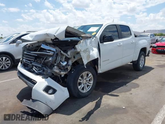 ✅ 2020 GMC Canyon 2WD SLE • VIN: 1GTG5CEN5L1223297 • Лот: 42806221. Опубликован ранее на IAAI с пробегом 120 403 миль. Бесплатный доступ к архиву аукционных продаж из США и подробный отчёт об истории автомобиля на DreamBid. Изображение 2.