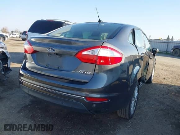 ✅ 2018 Ford Fiesta Titanium • VIN: 3FADP4CJ4JM133258 • Lot: 41452972. Listed on IAAI with 143,462 mi. Free auction sales archive from the USA and detailed vehicle history report at DreamBid. Image 4.