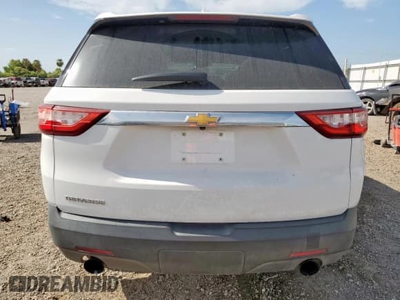 ✅ 2018 Chevrolet Traverse LS • VIN: 1GNERFKW0JJ172533 • Lot: 65902125. Wystawiony na Copart z przebiegiem 100 833 mil. Bezpłatny archiwum sprzedaży aukcyjnych z USA i szczegółowy raport historii pojazdu na DreamBid. Zdjęcie 6.