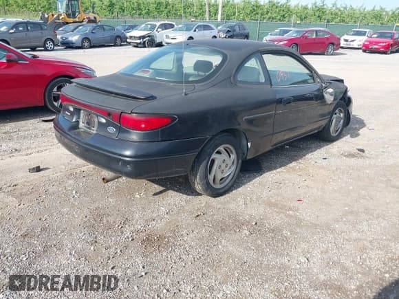✅ 2000 Ford Escort ZX2 • VIN: 3FAKP1139YR235632 • Lot: 42240451. Listed on IAAI with 139,532 mi. Free auction sales archive from the USA and detailed vehicle history report at DreamBid. Image 4.