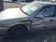 ✅ 2000 Toyota Corolla VE • VIN: 2T1BR12E4YC364551 • Лот: 43865745. Опубликован ранее на IAAI с пробегом 192 249 миль. Бесплатный доступ к архиву аукционных продаж из США и подробный отчёт об истории автомобиля на DreamBid. Изображение 6.