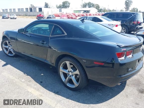 ✅ 2013 Chevrolet Camaro LT • VIN: 2G1FC1E38D9124385 • Lot: 43013478. Wystawiony na IAAI z przebiegiem 128 710 mil. Bezpłatny archiwum sprzedaży aukcyjnych z USA i szczegółowy raport historii pojazdu na DreamBid. Zdjęcie 3.