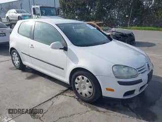✅ 2009 Volkswagen Rabbit S • VIN: WVWBB71K09W101853 • Lot: 41658313. Listed on IAAI with 83,221 mi. Free auction sales archive from the USA and detailed vehicle history report at DreamBid. Image 1.