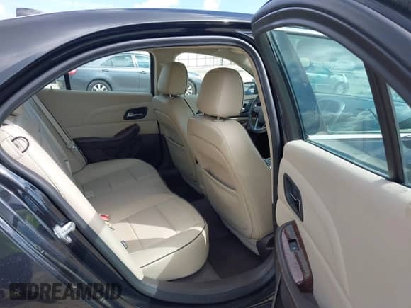 2013 Chevrolet Malibu LTZ with VIN 1G11J5SX1DF303499, listed as a IAAI auction lot 42648683 with 111,496 mi miles and . Bid and sale history available at DreamBid. Image 8.