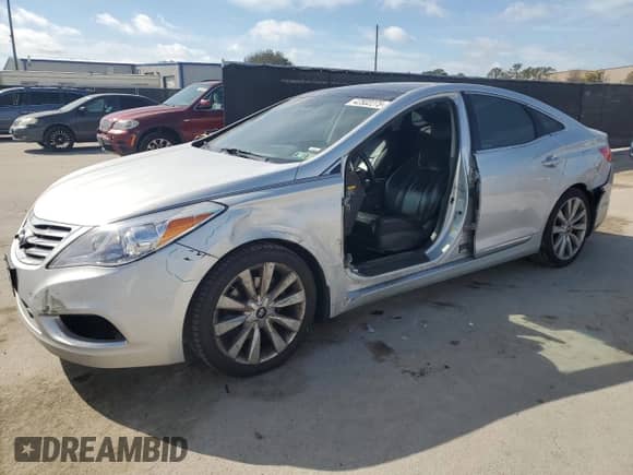 2014 Hyundai Azera Limited с VIN KMHFH4JG0EA353390, выставлен на аукционе Copart как лот 42502275 с пробегом 105 868 миль миль и Списание • Salvage title. История ставок и продаж доступна на DreamBid. Изображение 1.