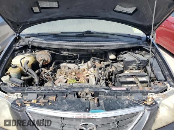 ✅ 2001 Mazda MPV DX • VIN: JM3LW28G310173674 • Lot: 75312034. Listed on Copart with Not provided. Free auction sales archive from the USA and detailed vehicle history report at DreamBid. Image 12.