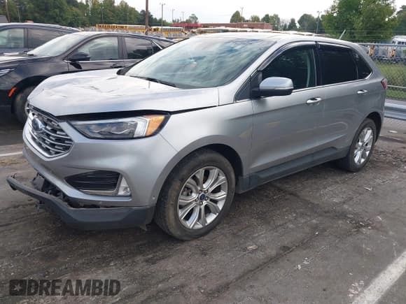 ✅ 2020 Ford Edge Titanium • VIN: 2FMPK3K9XLBB34860 • Lot: 43333566. Listed on IAAI with 110,473 mi. Free auction sales archive from the USA and detailed vehicle history report at DreamBid. Image 2.
