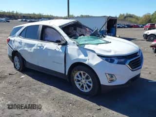2021 Chevrolet Equinox LS z VIN 3GNAXSEV9MS177393, wystawiony jako IAAI lot #43393944 z przebiegiem 65 872 mil mil oraz . Historia ofert i sprzedaży dostępna na DreamBid. Obrazek 1.