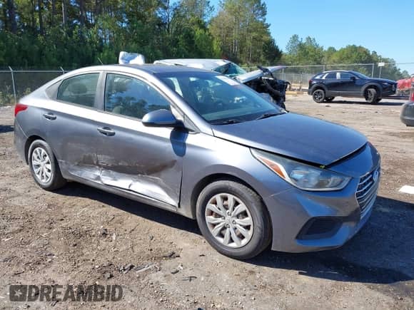2019 Hyundai Accent SE z VIN 3KPC24A38KE080617, wystawiony jako IAAI lot #43469463 z przebiegiem 156 782 mil mil oraz . Historia ofert i sprzedaży dostępna na DreamBid. Obrazek 1.
